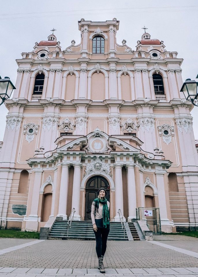 Monica exploring Vilnius' architecture - Lithuania travel guide.