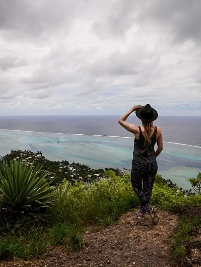 Monica looking out over Moorea from Magic Mountain - A Moorea & Tahiti Packing List for activities and days out on the town.