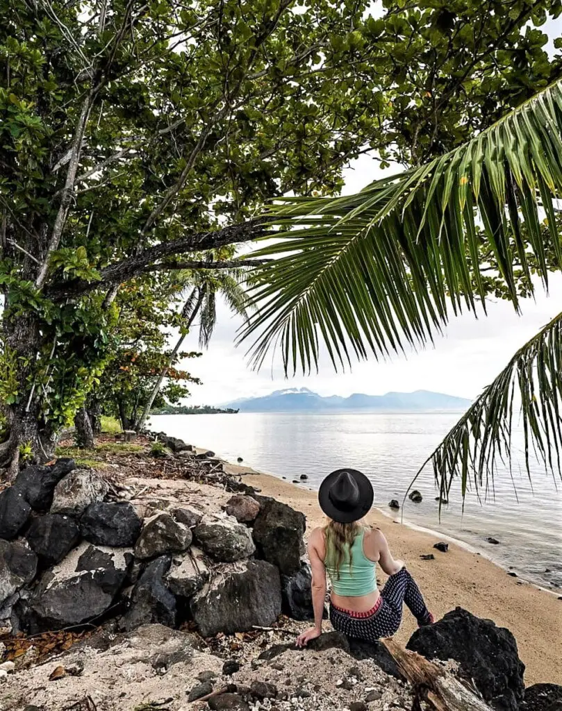 Monica on the beach of Moorea - A Moorea & Tahiti Packing List.