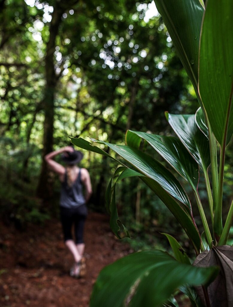 Monica hiking in the jungle - A Moorea & Tahiti Packing List for hiking.