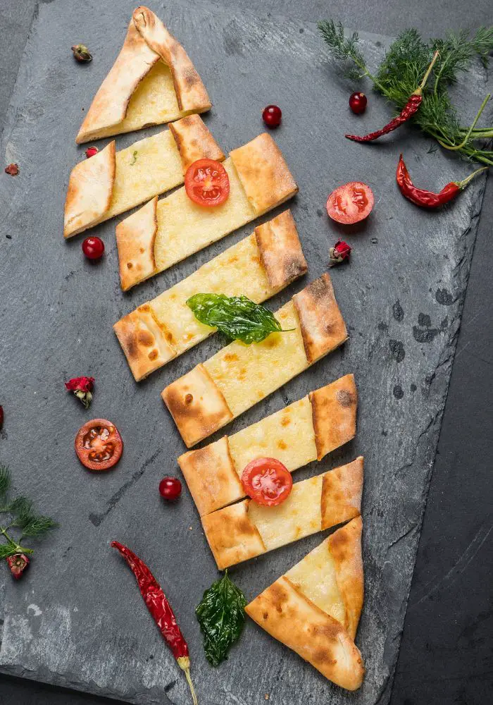 A delicious cheese pide pizza - an essential meal for your One Day in Istanbul Itinerary.