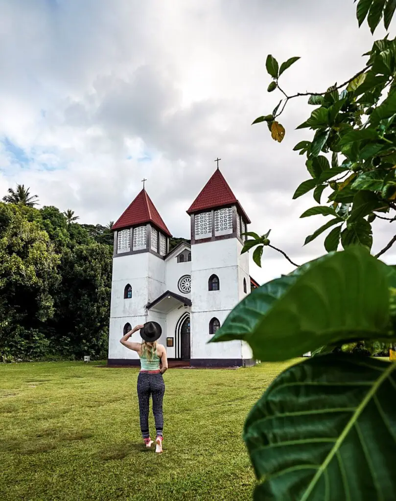 Monica exploring the small churches of Moorea, one of the best Things To Do in Moorea, French Polynesia.