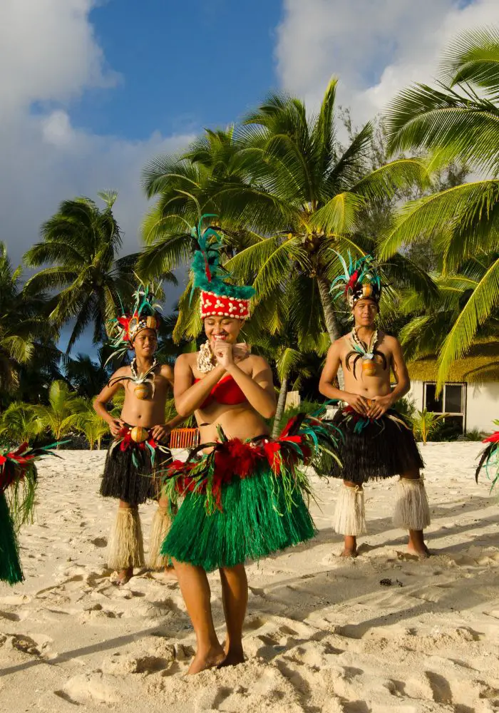 Tahitian dancers at the Tiki Village, one of the best Things To Do in Moorea, French Polynesia.