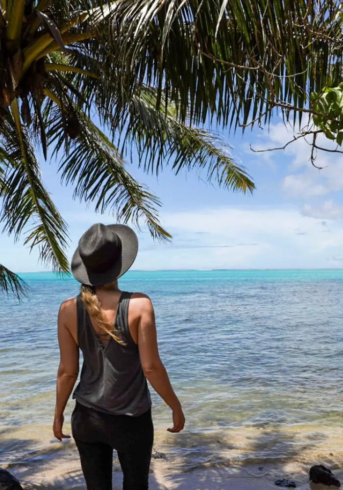 Monica looking out at the ocean as a solo female traveler in French Polynesia - is Tahiti safe?