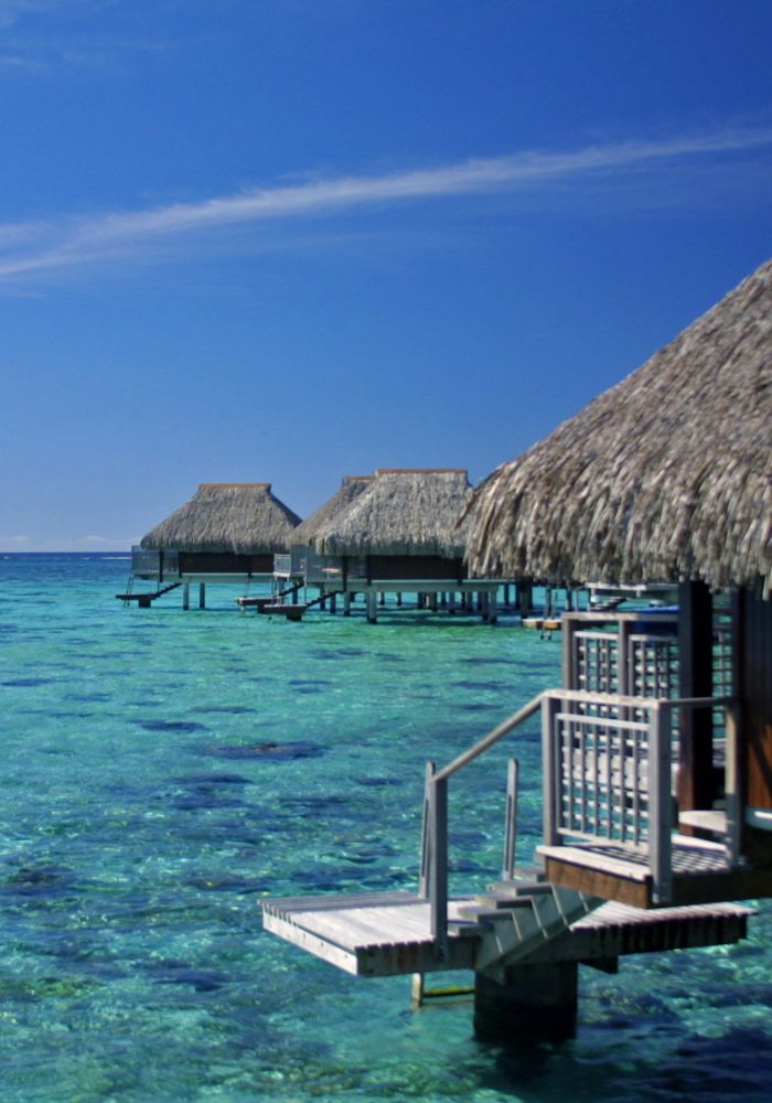 The incredible blue lagoon at the Hilton, one of The Best Places to Snorkel in Moorea.