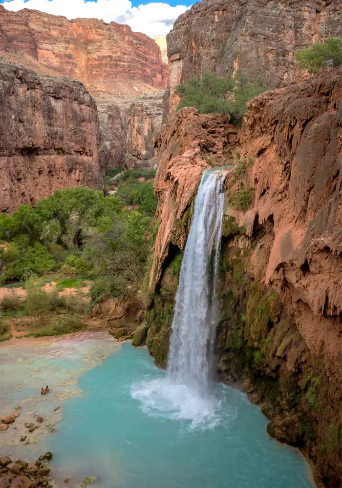 Milky blue waters at Havasupai Falls, one of the best Arizona Bucket List Things To Do.