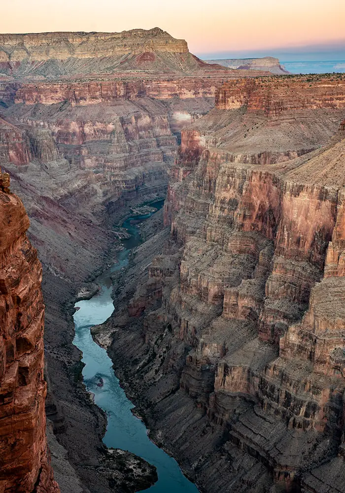 The tall brown and red cliffs of Grand Canyon North Rim, one of the best Arizona Bucket List Things To Do.