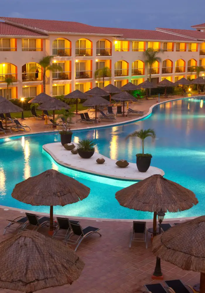 Beautiful hotel grounds with a swimming pool, available in Los Cabos.