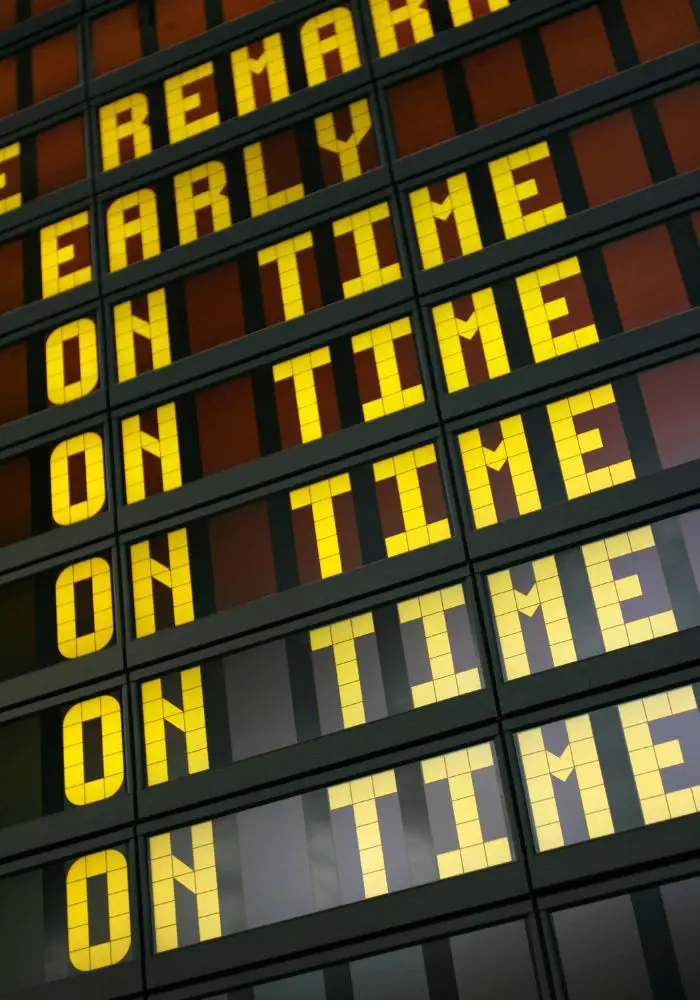 An airplane sign indicating on time flights - Long Haul Flight Essentials.