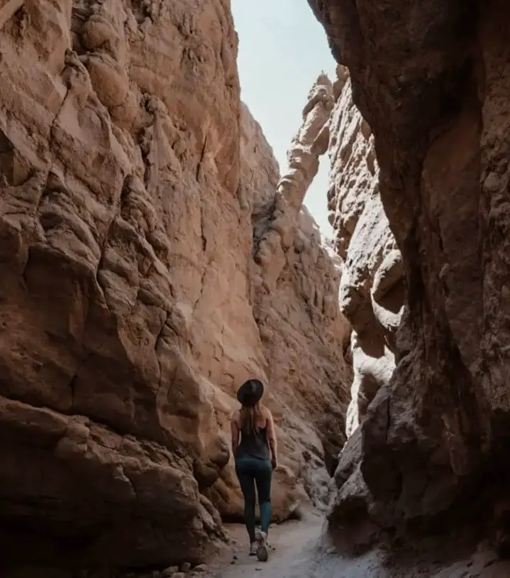 Monica hiking the slot canyon, Things To Do in Borrego Springs, California.
