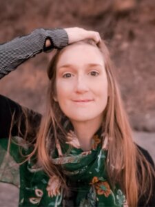 Monica from This Rare Earth, hiking and solo traveling in the California desert.