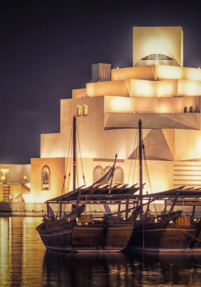 The Museum of Islamic Art at night, on the Doha harbor - A One Day in Doha Itinerary.