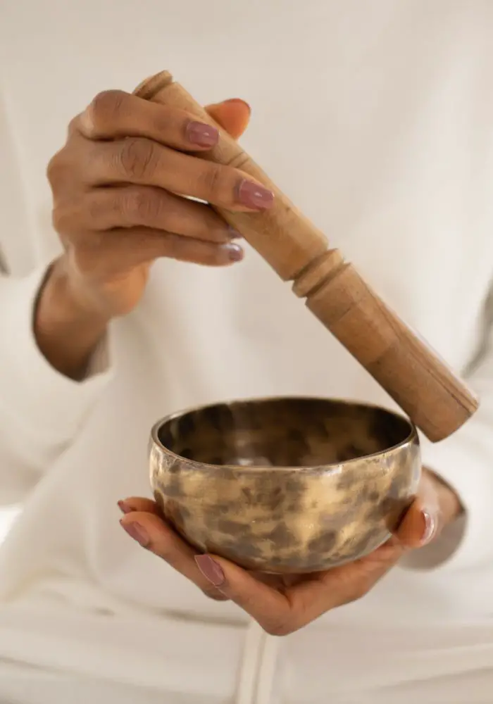 A close up of a singing bowl at a soundbath, one of the Best Places To Visit in Kathmandu, Nepal.
