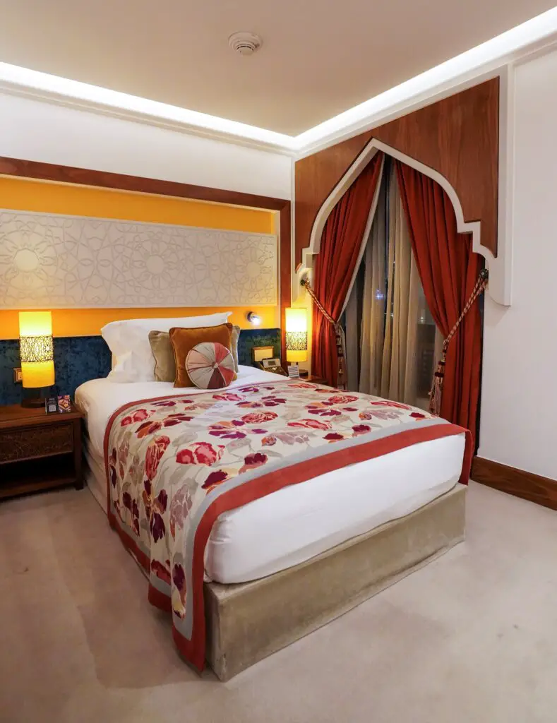 Red and orange tones in a hotel room, booked for a Doha stopover.
