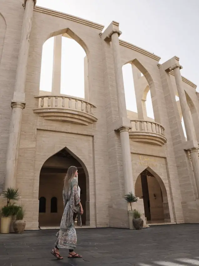 Monica walking near the katara Amphitheatre, one of the best Things To Do in Katara Cultural Village in Doha.