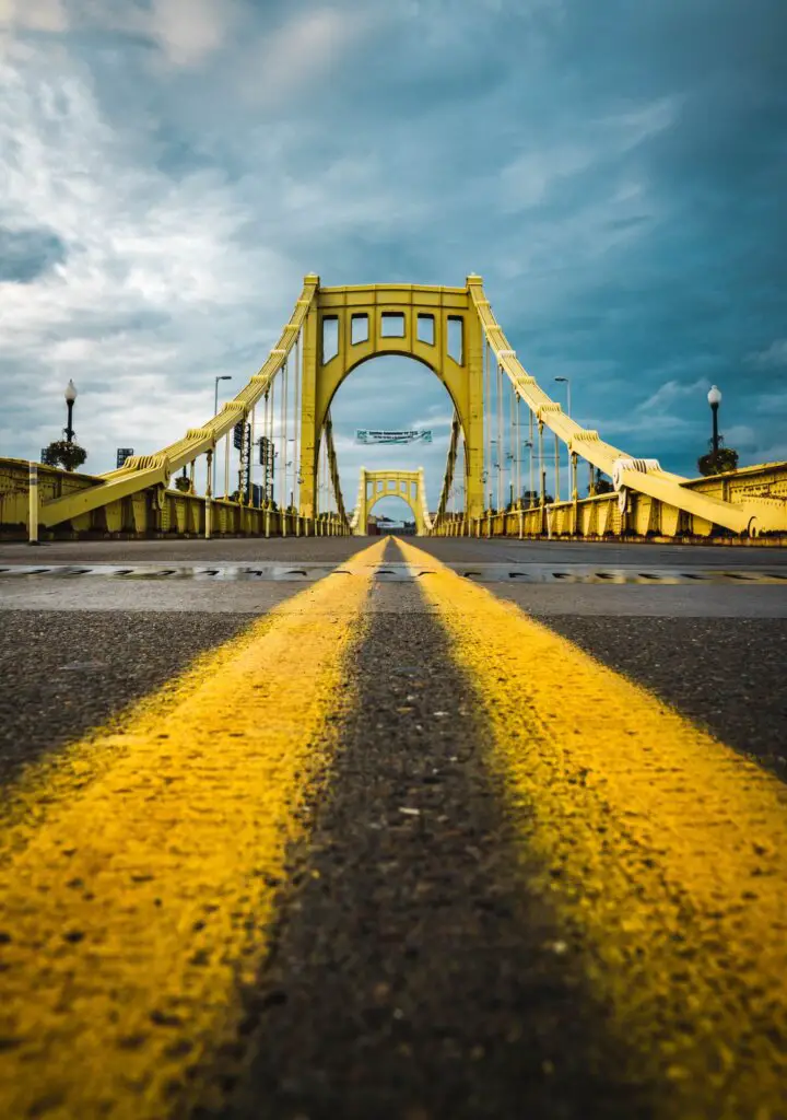 The yellow road lines and the yellow bridge in Pittsburgh.