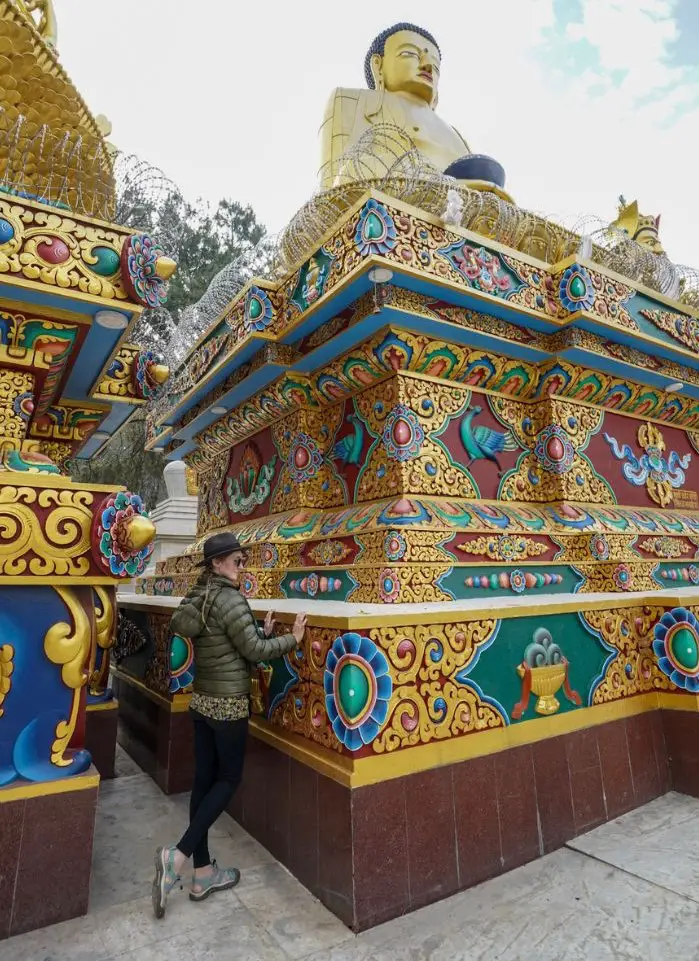 The colorful base of a Buddha statue - Is Nepal Worth Visiting? 10 Reasons to Go.