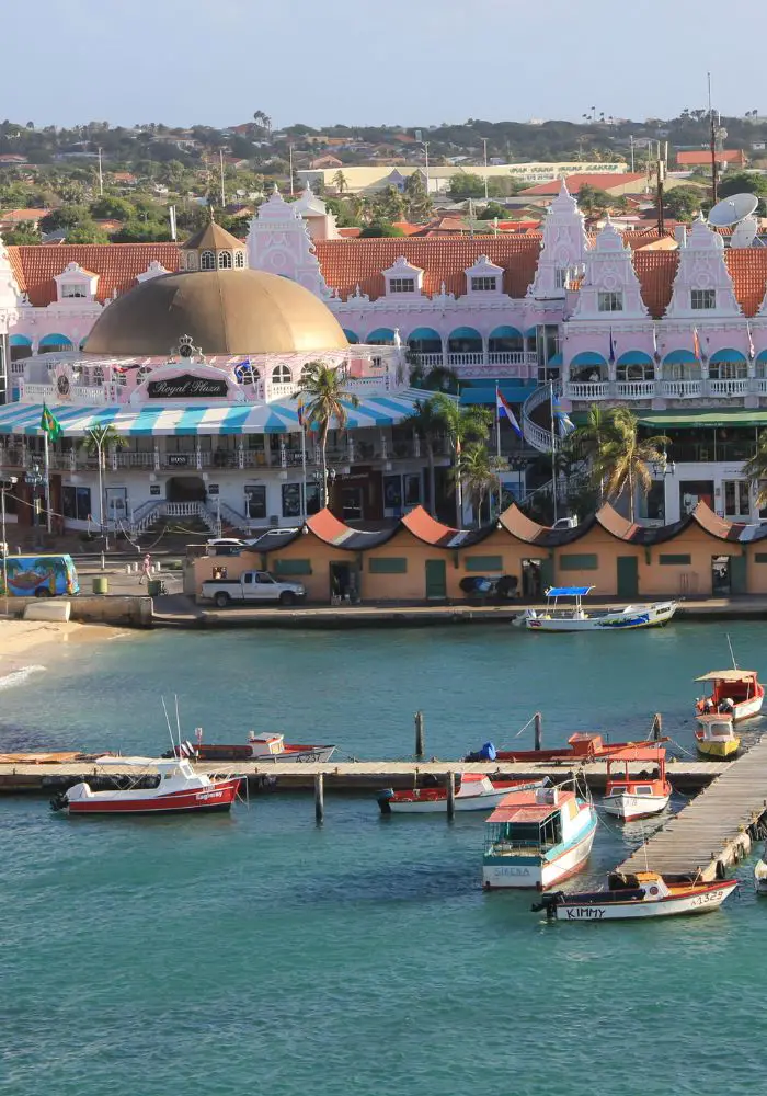 Oranjestad from above, with colorful buildings and boats for transportation in Aruba.