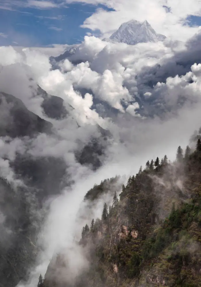 Monsoon season in Nepal bringing in clouds and mist int he valley.