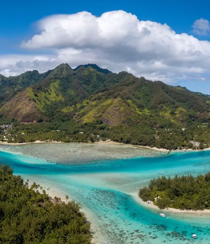 The bright blue water and green islands in French Polynesia, Tahiti's country name.
