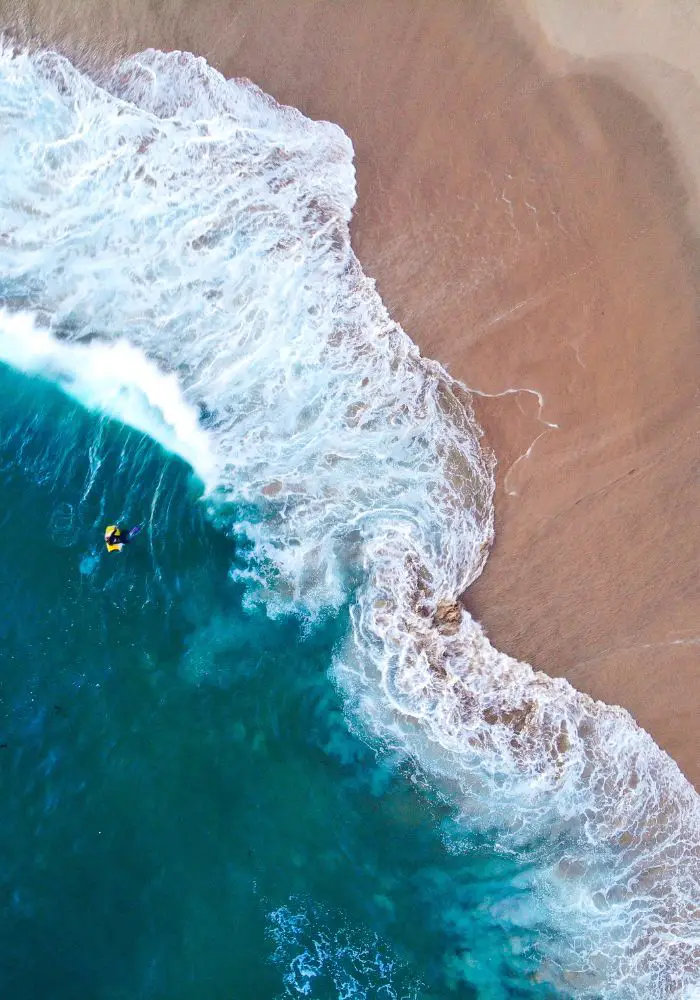An aerial view of The Wedge and its blue water, one of the closest beaches to Phoenix.