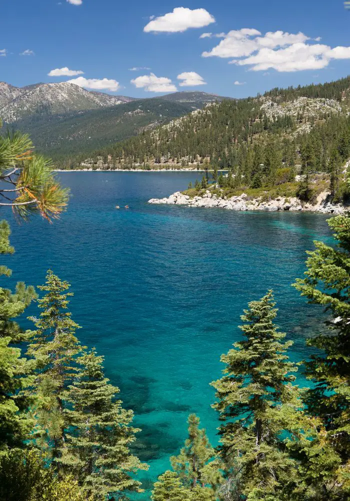 The bright blue water and green trees at Lake Tahoe, one of the best weekend trips from San Diego.