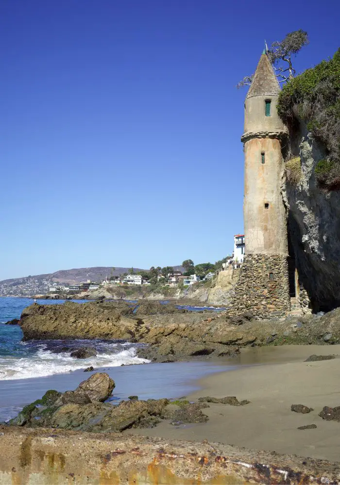 The tall Pirate Tower next to the ocean in Laguna Beach, one of the best weekend trips from San Diego.