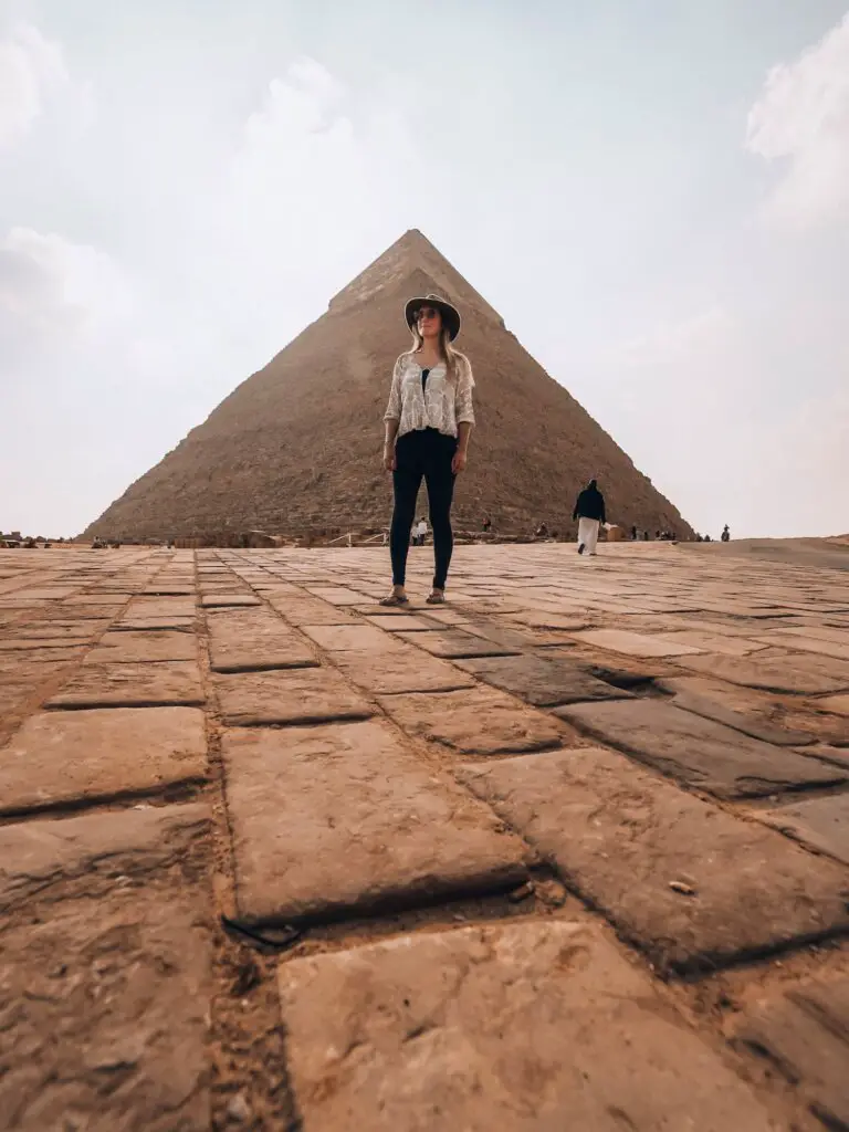 Monica standing in front of a pyramid in the Giza Complex.