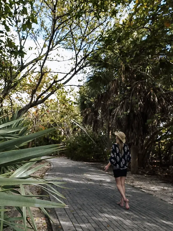 Monica walking the brick path around Peanut Island, one of the warmest places in Florida in February.