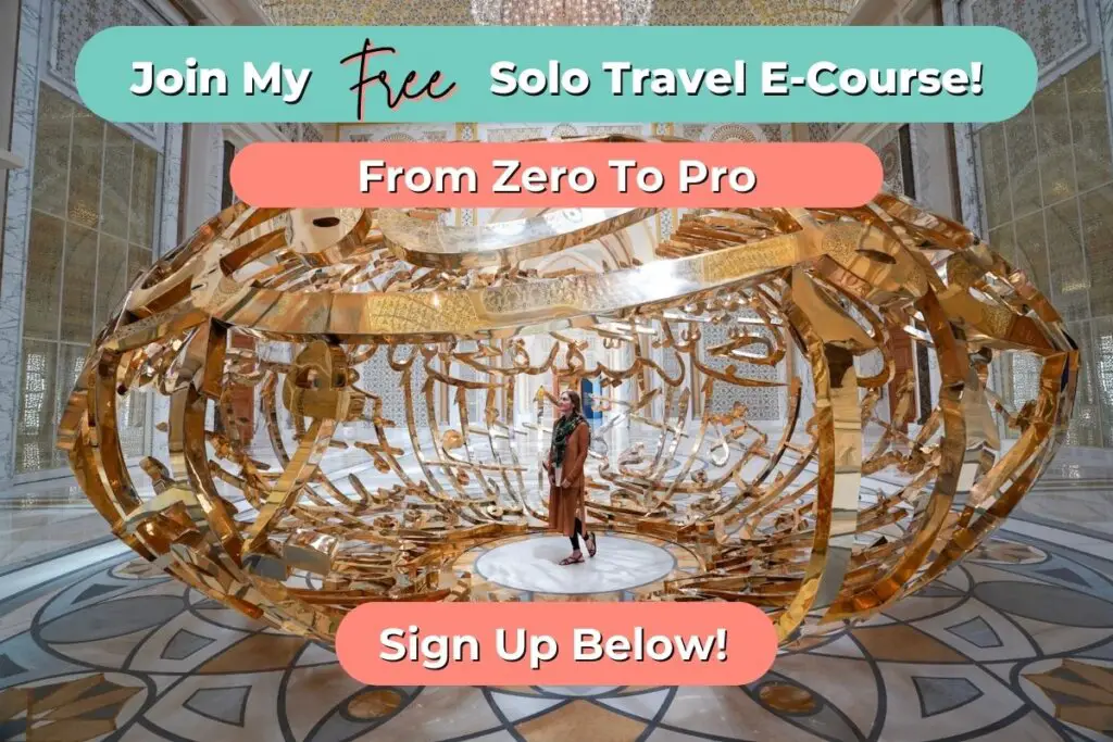 Solo Travel Course promo image with Monica inside a sculpture on a solo trip.