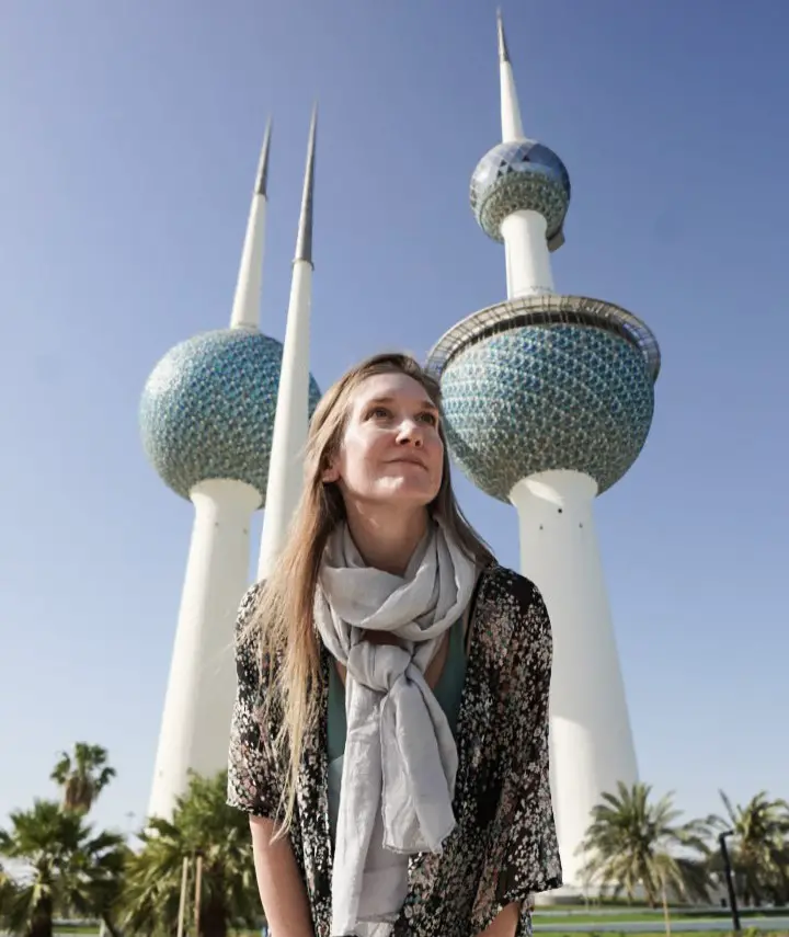 Girl tourist in front of the Kuwait Towers.