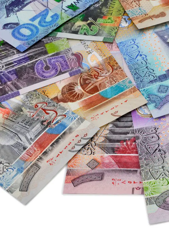 Kuwaiti dinar in many denominations and colors.