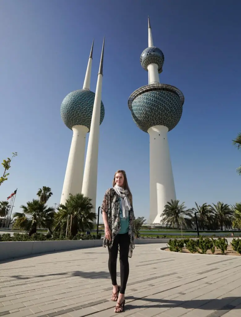 Monica visiting the Kuwait Towers, a great place to visit in Kuwait on a budget, on a sunny day