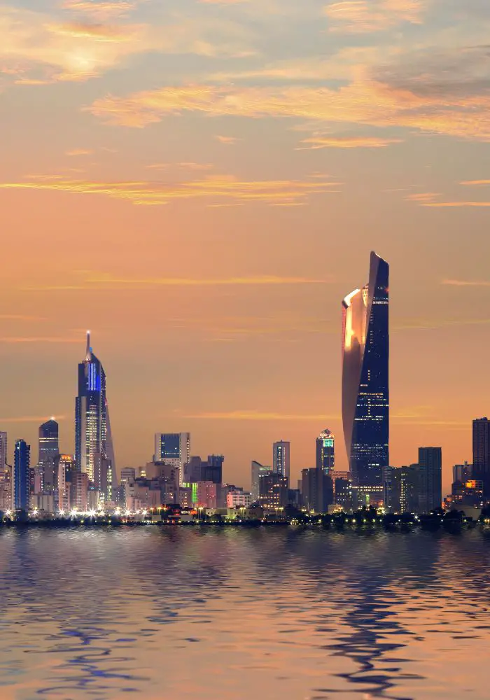 The Kuwait skyline during a pink sunset.