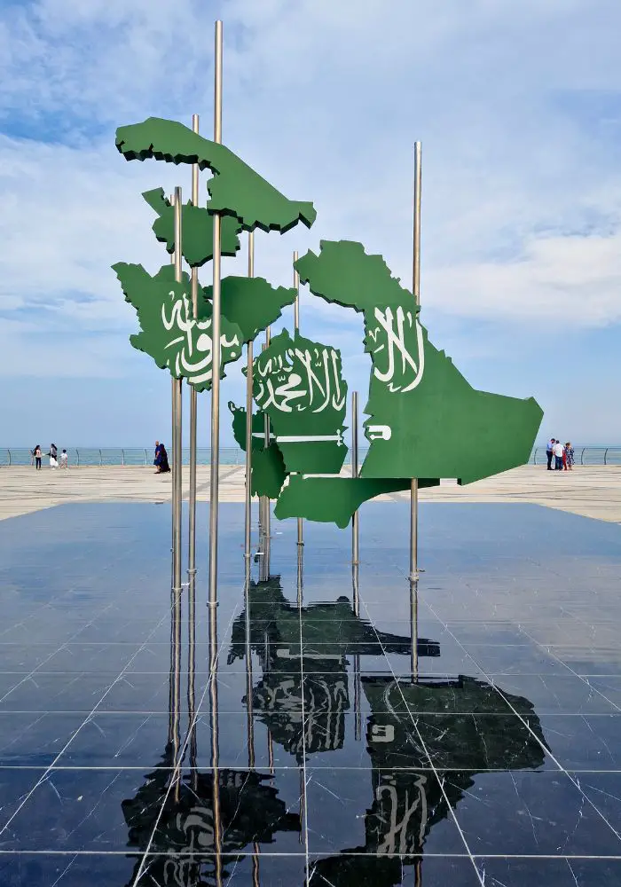 The Saudi Arabia flag sculpture near the seashore.