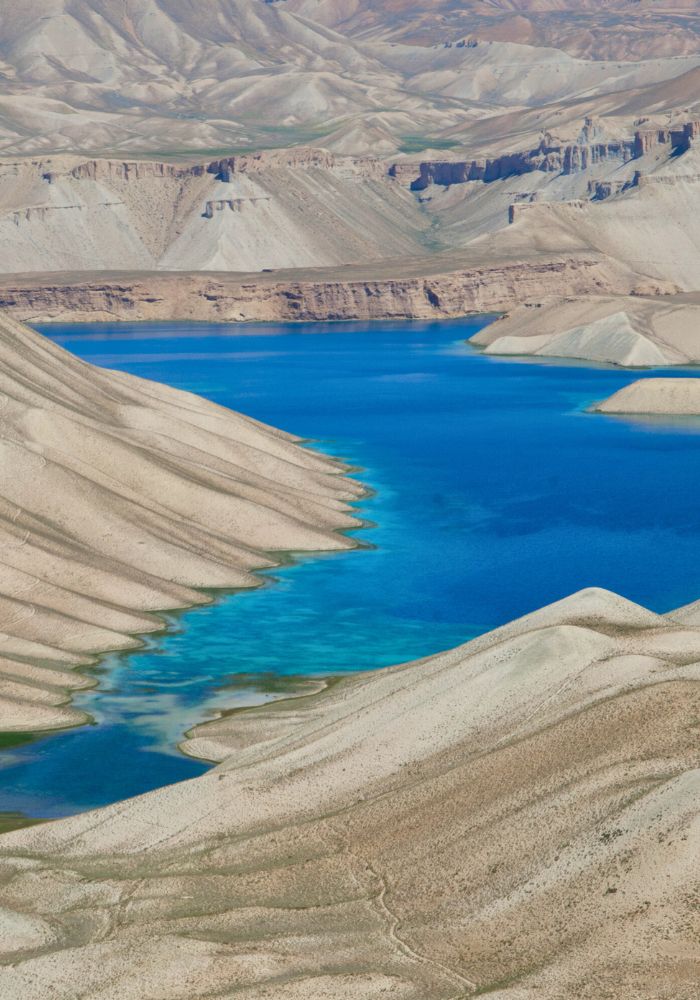 The bright blue waters of Band e Amir, one of the most famous places to visit in Afghanistan.