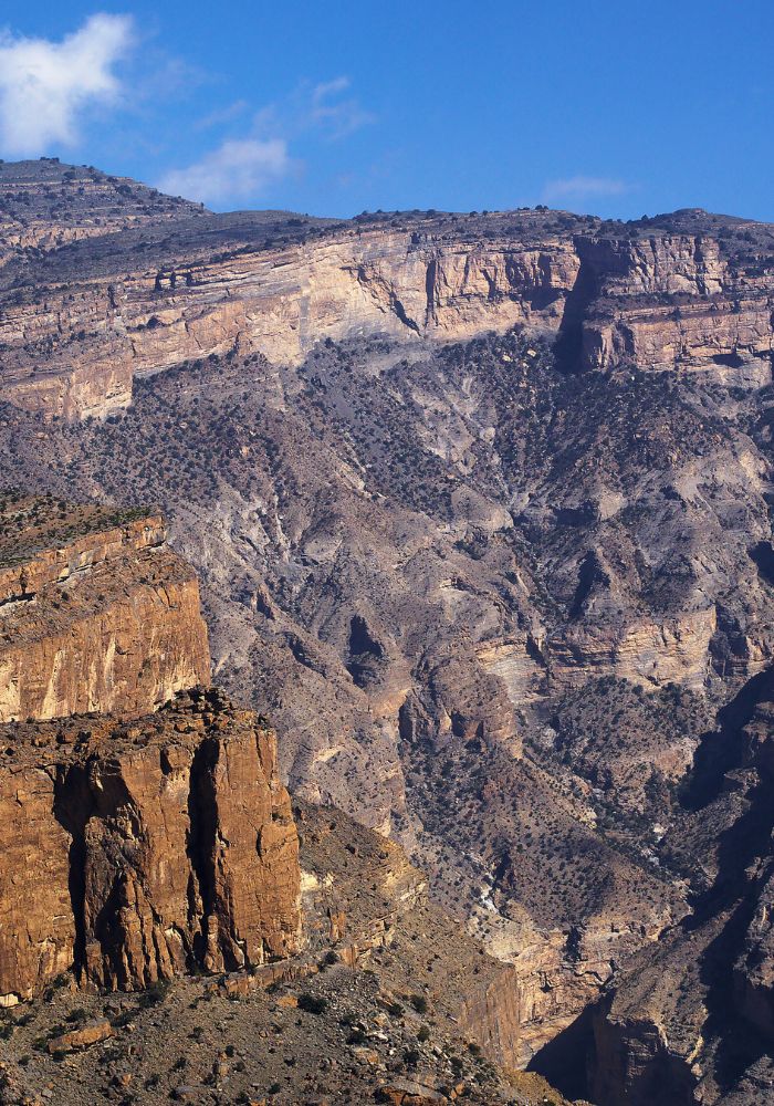 The rocky rugged surface of Jebel Shams, an adventurous day trip in Oman.